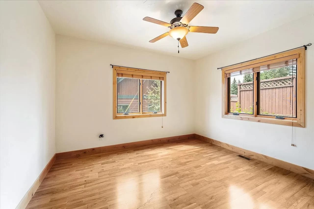 Spacious bedroom with dual windows