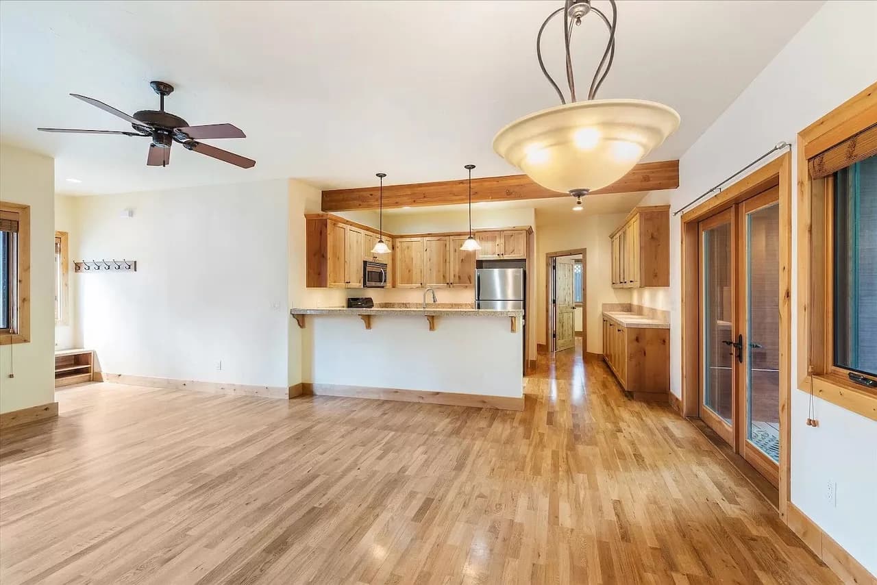 Granite kitchen with knotty pine cabinetry